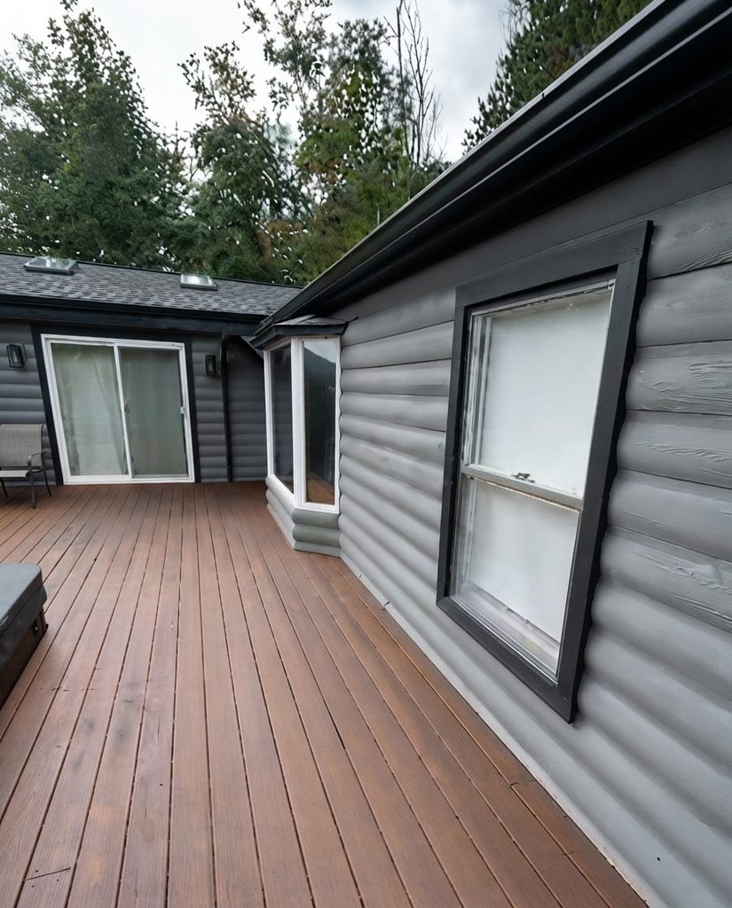 After deck painting New York project showing a freshly painted outdoor deck